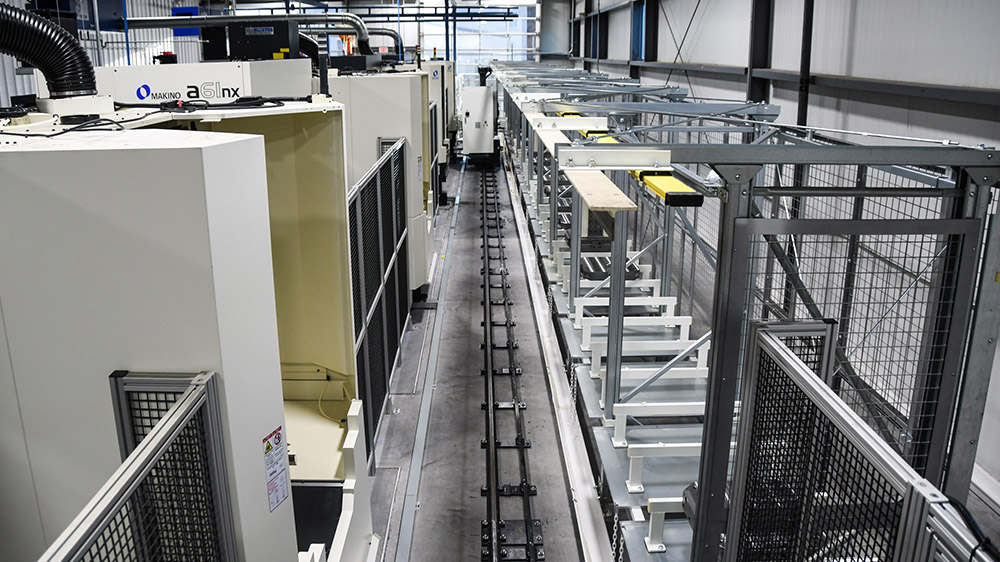 Makino A61 conveyor used for capabilities page header